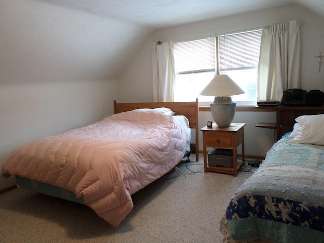 bedroom featuring vaulted ceiling