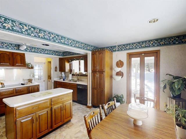 dining area featuring french doors and sink