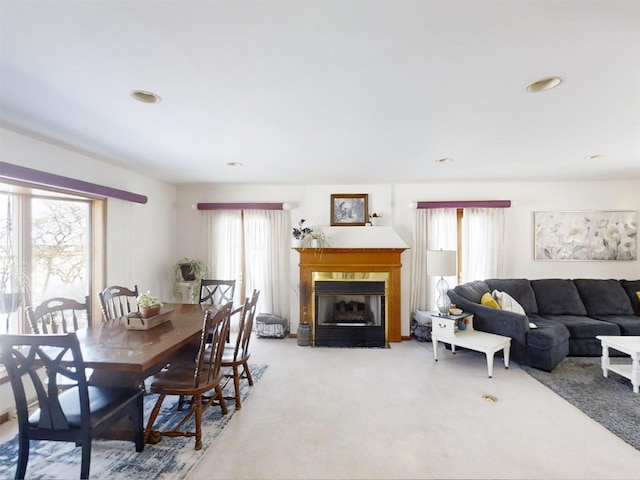 dining space with carpet floors and a wealth of natural light