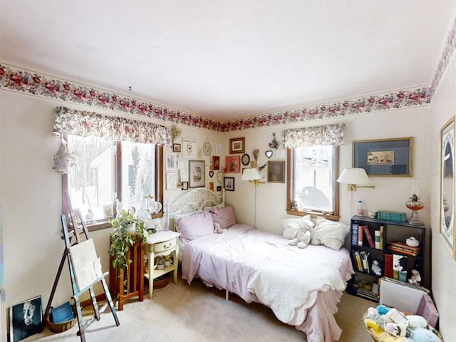 bedroom with light carpet