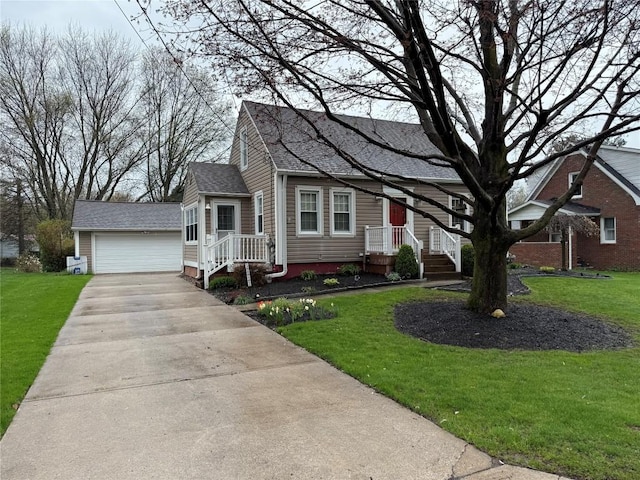 view of front of home with a front lawn, a garage, and roof with shingles