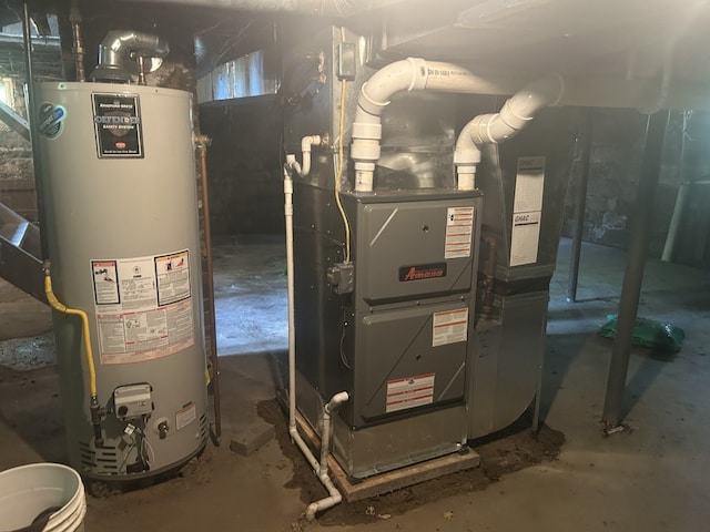 495 E Jamestown Rd, Greenville, PA 16125 - utility room featuring gas water heater and heating unit