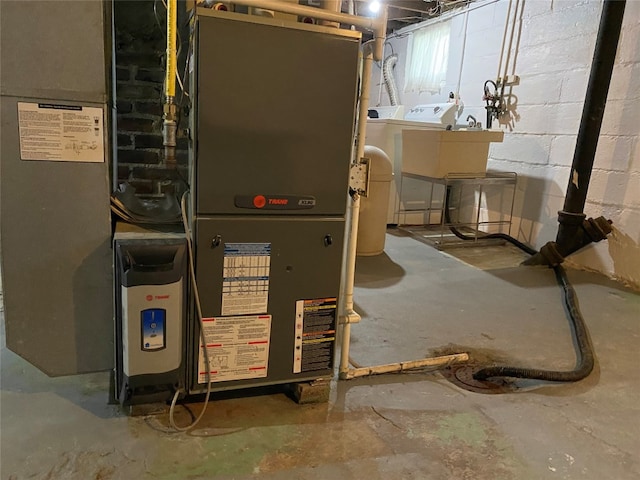utilities featuring washer and clothes dryer