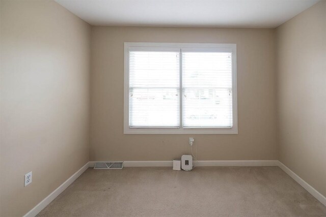 2861 S Birch Run, Millcreek, PA 16506 - spare room featuring plenty of natural light and light colored carpet
