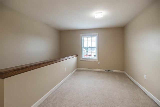 2861 S Birch Run, Millcreek, PA 16506 - unfurnished room featuring baseboards and light colored carpet
