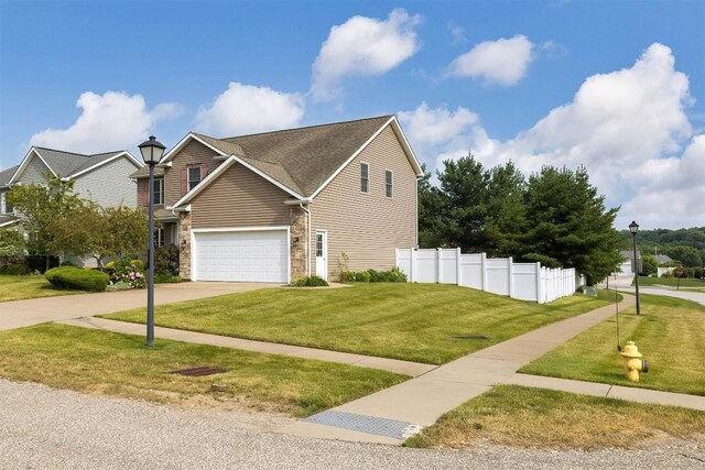 2861 S Birch Run, Millcreek, PA 16506 - view of front facade with driveway and a garage