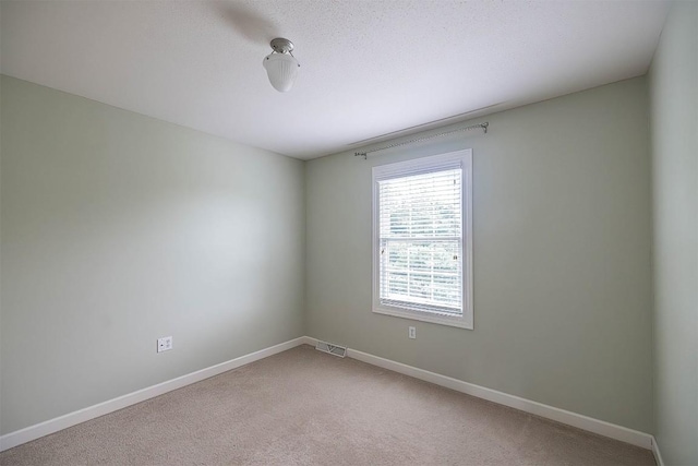 2861 S Birch Run, Millcreek, PA 16506 - spare room with baseboards and light carpet