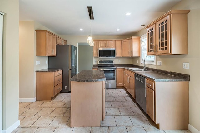 2861 S Birch Run, Millcreek, PA 16506 - kitchen with appliances with stainless steel finishes, dark countertops, a center island, glass insert cabinets, and recessed lighting