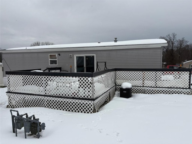 view of snow covered property