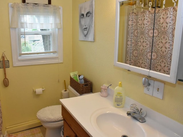 10987 Henry St, Conneaut Lake, PA 16316 - bathroom featuring baseboard heating, vanity, and a shower with shower curtain