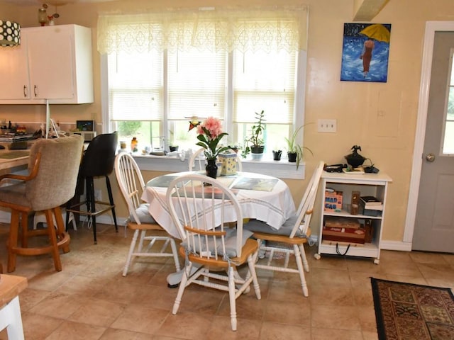 10987 Henry St, Conneaut Lake, PA 16316 - dining room featuring light tile patterned flooring