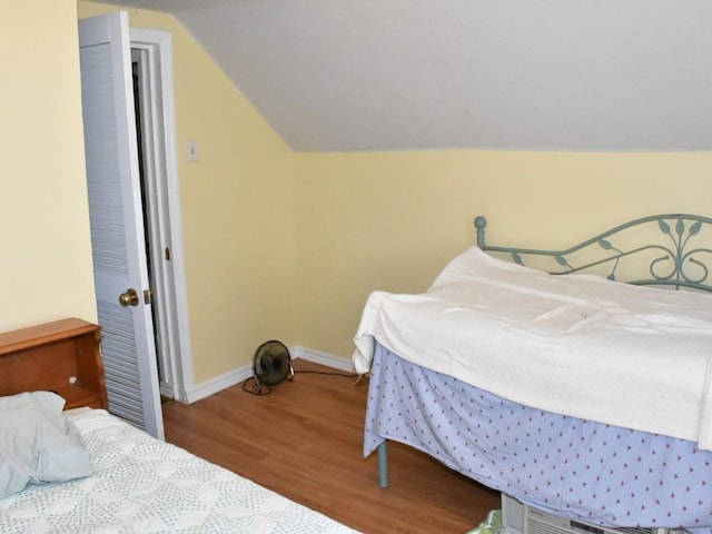 10987 Henry St, Conneaut Lake, PA 16316 - bedroom with wood finished floors and vaulted ceiling