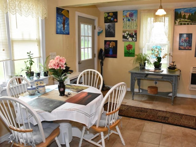 10987 Henry St, Conneaut Lake, PA 16316 - dining area with tile patterned flooring and heating unit