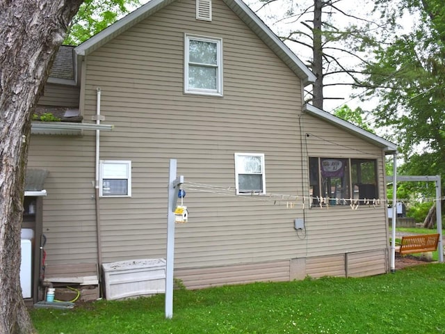 10987 Henry St, Conneaut Lake, PA 16316 - view of property exterior featuring a yard