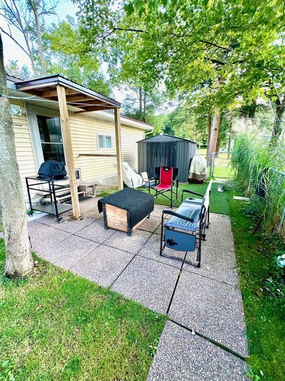 50 Maplenut Ln, Erie, PA 16510 - view of patio with a gazebo and an outdoor living space
