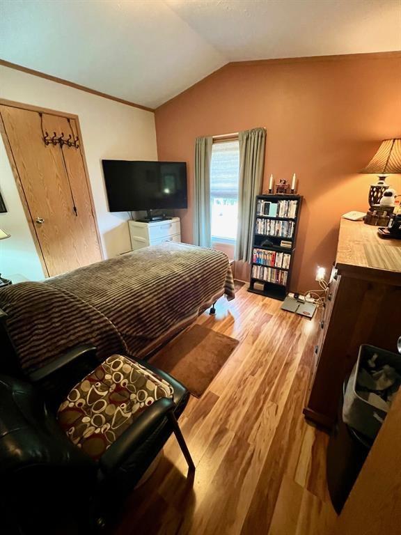 50 Maplenut Ln, Erie, PA 16510 - bedroom featuring vaulted ceiling and wood finished floors