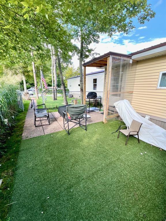 50 Maplenut Ln, Erie, PA 16510 - view of yard featuring a patio area