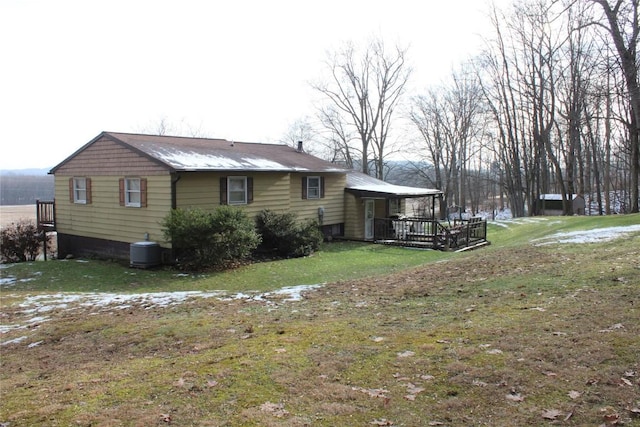 view of property exterior featuring a yard