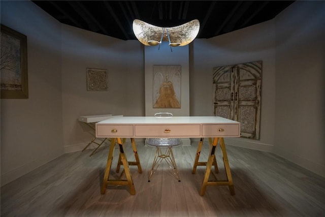 dining area featuring wood-type flooring