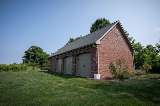 garage with a lawn