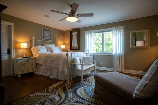 bedroom featuring hardwood / wood-style flooring and ceiling fan