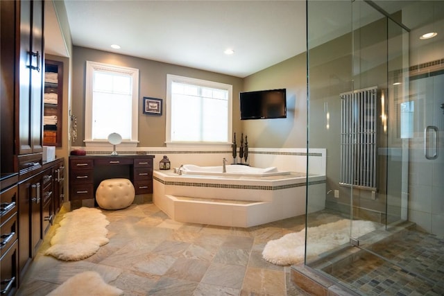 bathroom featuring plus walk in shower