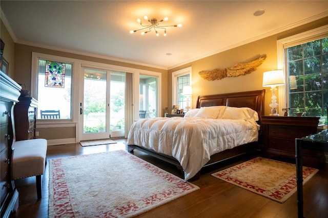 bedroom with a notable chandelier, dark hardwood / wood-style flooring, ornamental molding, and access to outside