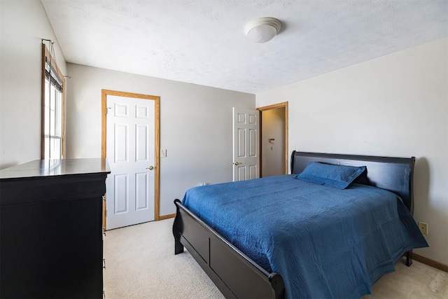 3706 Harbor Ridge Trl, Erie, PA 16510 - bedroom with light colored carpet, baseboards, and a textured ceiling