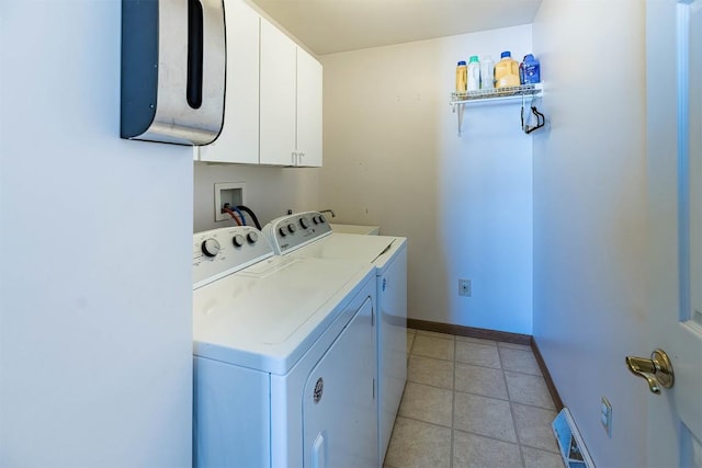3706 Harbor Ridge Trl, Erie, PA 16510 - laundry area featuring washer and dryer, cabinet space, baseboards, and light tile patterned floors