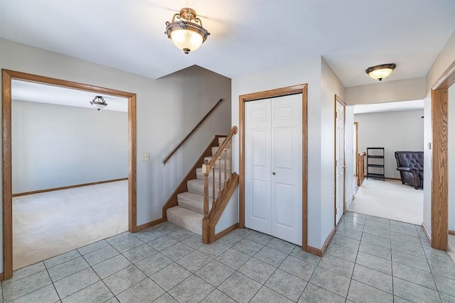 3706 Harbor Ridge Trl, Erie, PA 16510 - stairs featuring carpet flooring, baseboards, and tile patterned flooring