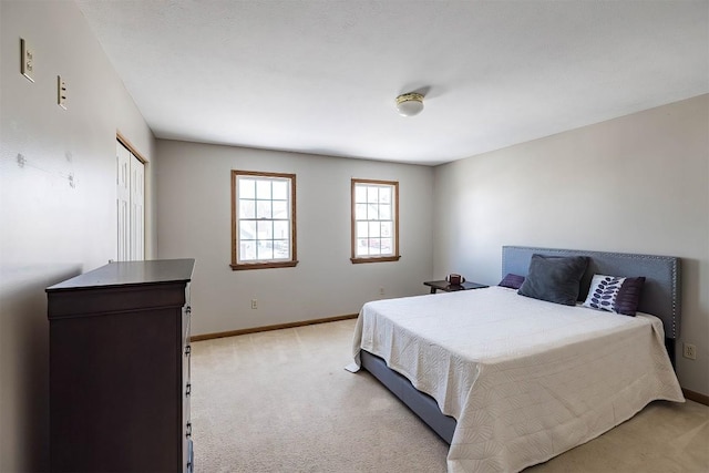 3706 Harbor Ridge Trl, Erie, PA 16510 - bedroom featuring light colored carpet, baseboards, and a closet