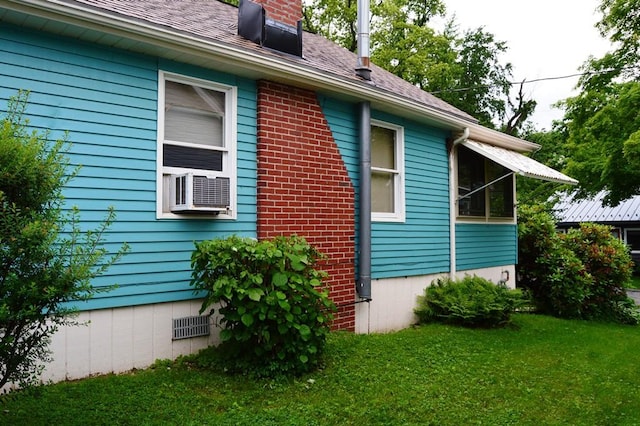 105 Hickory St, Edinboro, PA 16412 - view of side of home with a chimney, cooling unit, a lawn, and a shingled roof