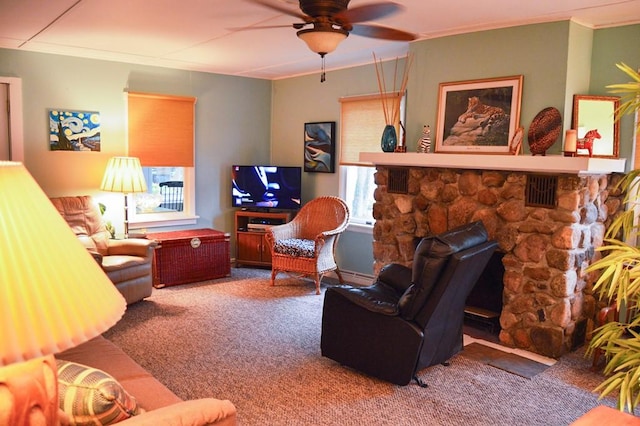 105 Hickory St, Edinboro, PA 16412 - carpeted living area with crown molding, a ceiling fan, and a fireplace