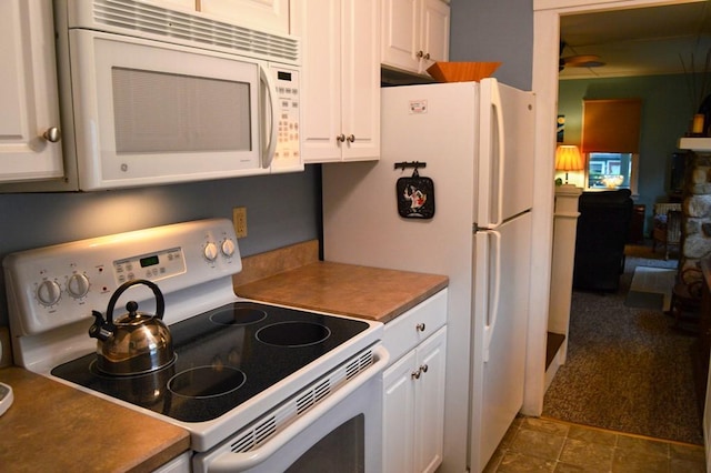 105 Hickory St, Edinboro, PA 16412 - kitchen featuring white appliances and white cabinetry