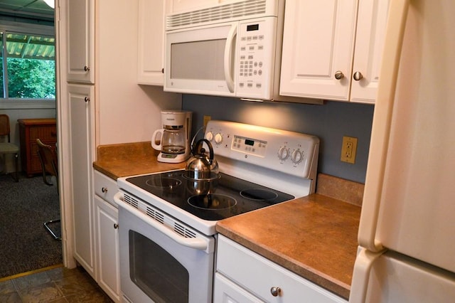 105 Hickory St, Edinboro, PA 16412 - kitchen featuring white appliances and white cabinetry