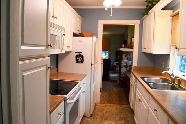 105 Hickory St, Edinboro, PA 16412 - kitchen with white appliances, white cabinetry, and dark carpet