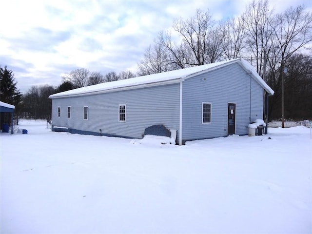 view of snow covered property