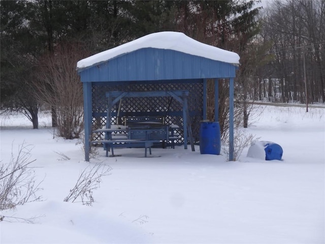 view of home's community with a carport and a gazebo