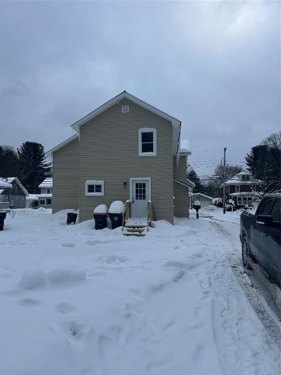 view of snow covered property