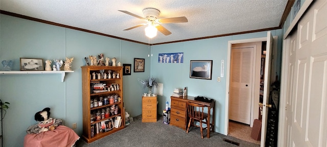 misc room featuring carpet flooring, crown molding, ceiling fan, and a textured ceiling