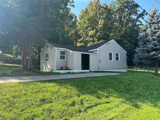 view of front of home with a front yard