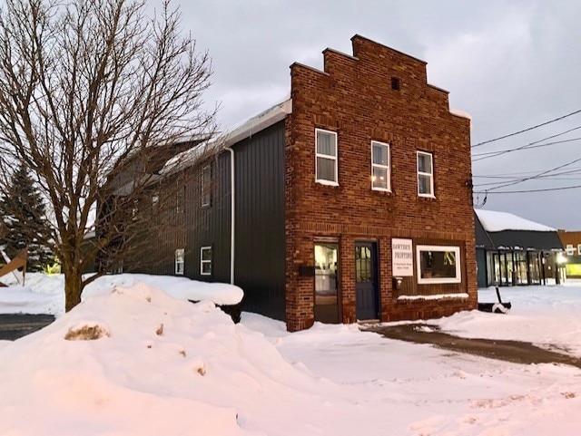 view of snow covered property