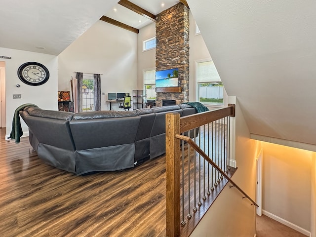 7723 Redbud Trl, Fairview, PA 16415 - living room featuring high vaulted ceiling, a fireplace, beamed ceiling, and wood finished floors
