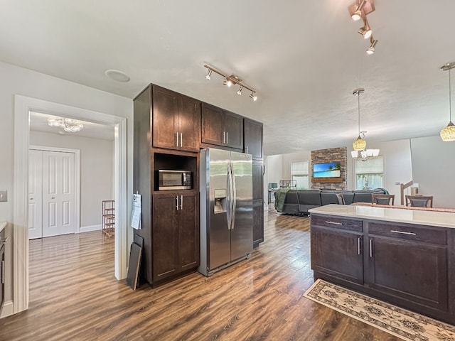 7723 Redbud Trl, Fairview, PA 16415 - kitchen featuring stainless steel appliances, rail lighting, a chandelier, and dark wood-style floors
