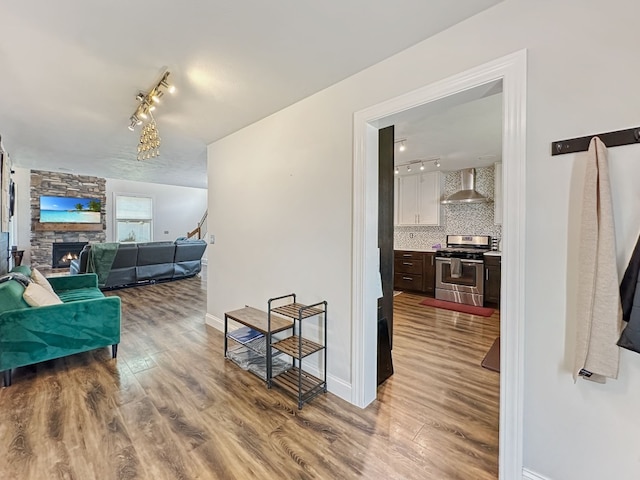 7723 Redbud Trl, Fairview, PA 16415 - hallway featuring wood finished floors and rail lighting