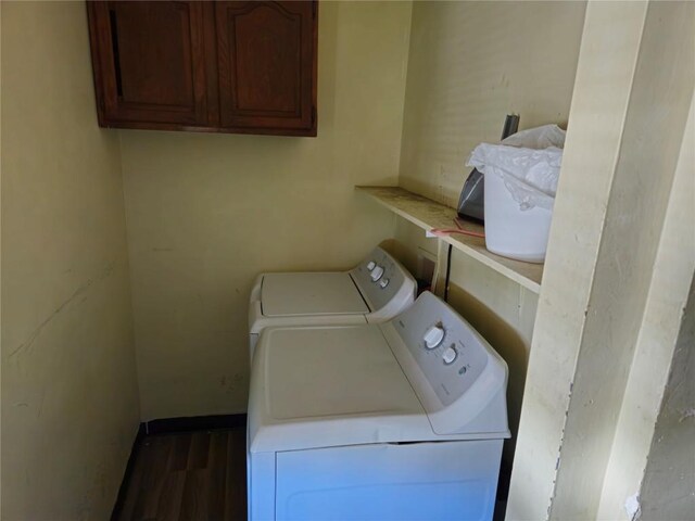 402 Reed St, Erie, PA 16507 - laundry room featuring washing machine and dryer, cabinet space, and wood finished floors