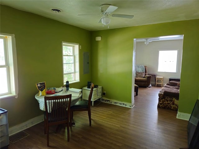 402 Reed St, Erie, PA 16507 - dining space with a ceiling fan, wood finished floors, healthy amount of natural light, and electric panel