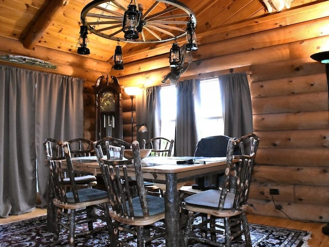 dining room with beamed ceiling, log walls, and wood ceiling