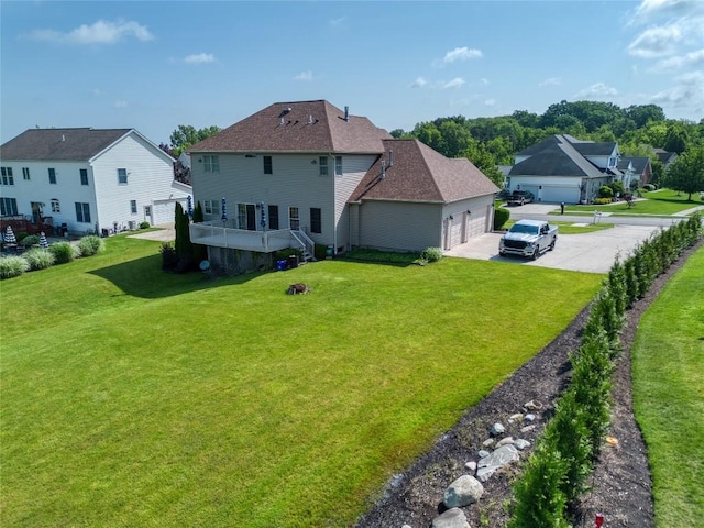 6020 Pebble Creek Dr, Fairview, PA 16415 - back of house with a yard, a residential view, and roof with shingles