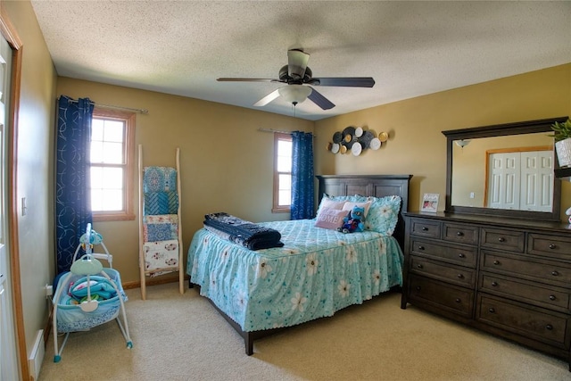 6020 Pebble Creek Dr, Fairview, PA 16415 - bedroom with multiple windows, light carpet, and a ceiling fan